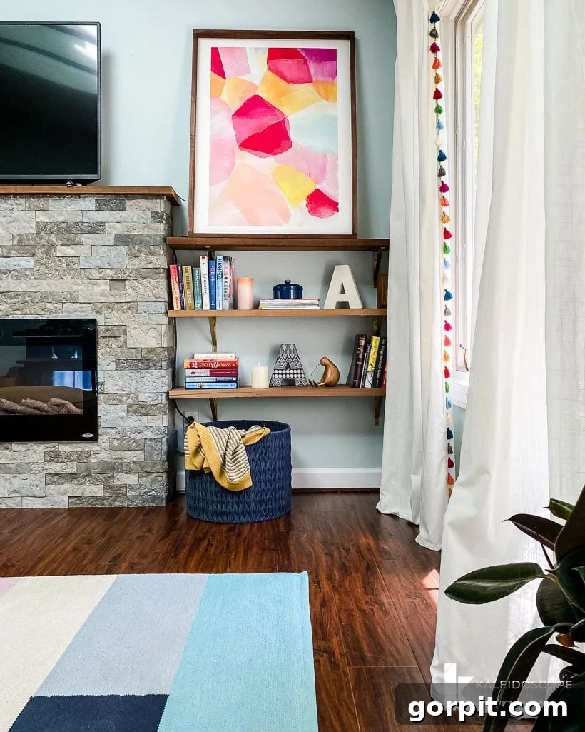 Vibrant artwork displayed above the fireplace in the colorful bedroom