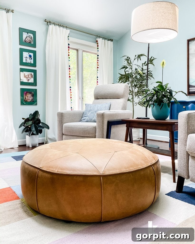 Vibrant colorful sitting area featuring modern recliners and personal touches