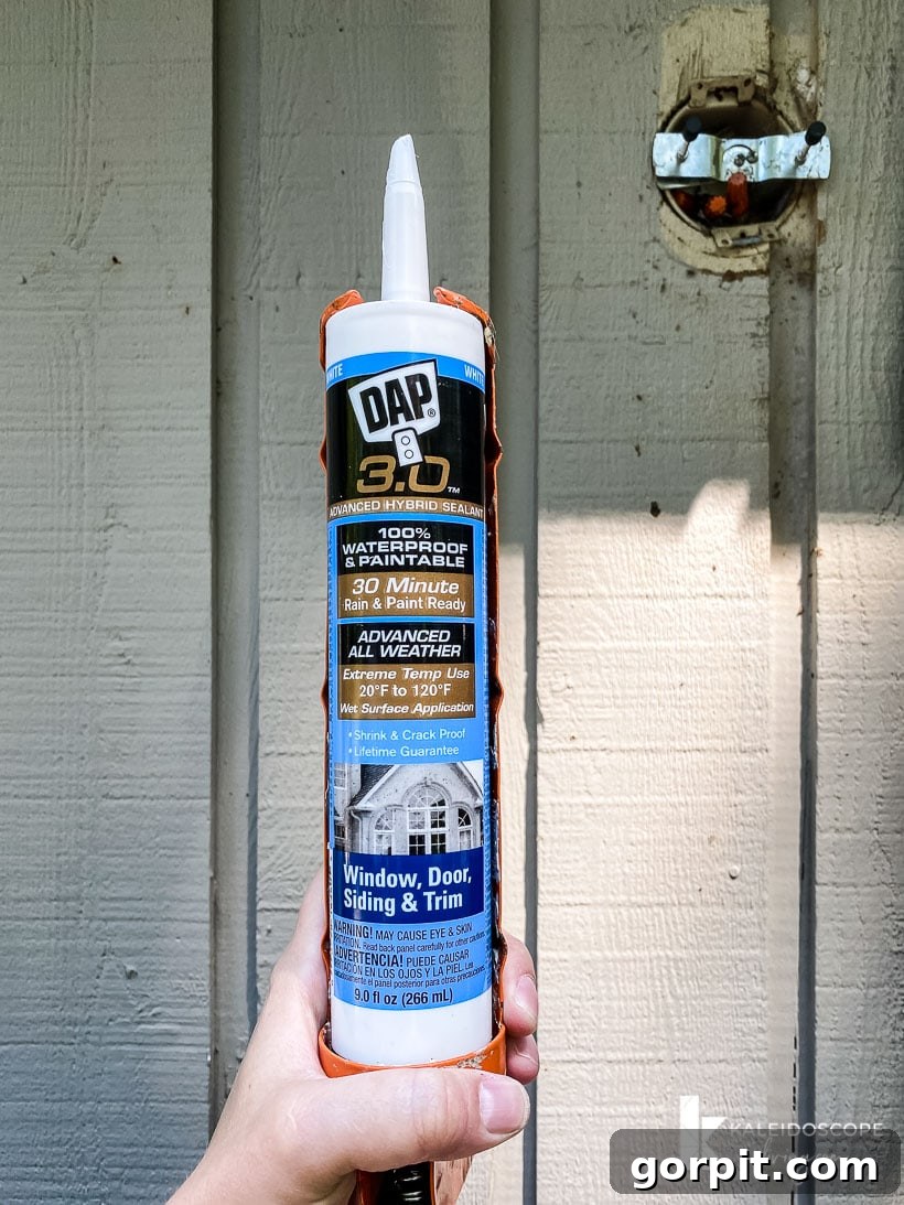 Sealing window frames with exterior caulk for weather protection