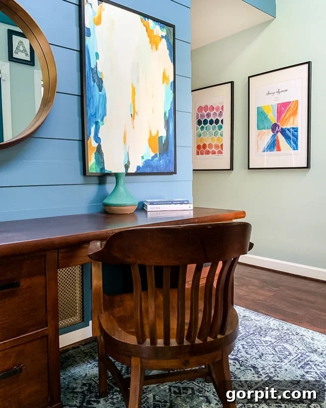 Colorful Rugs See How They Connect Our Home 12 Foyer with a colorful area rug and curated art, creating a welcoming and stylish entrance