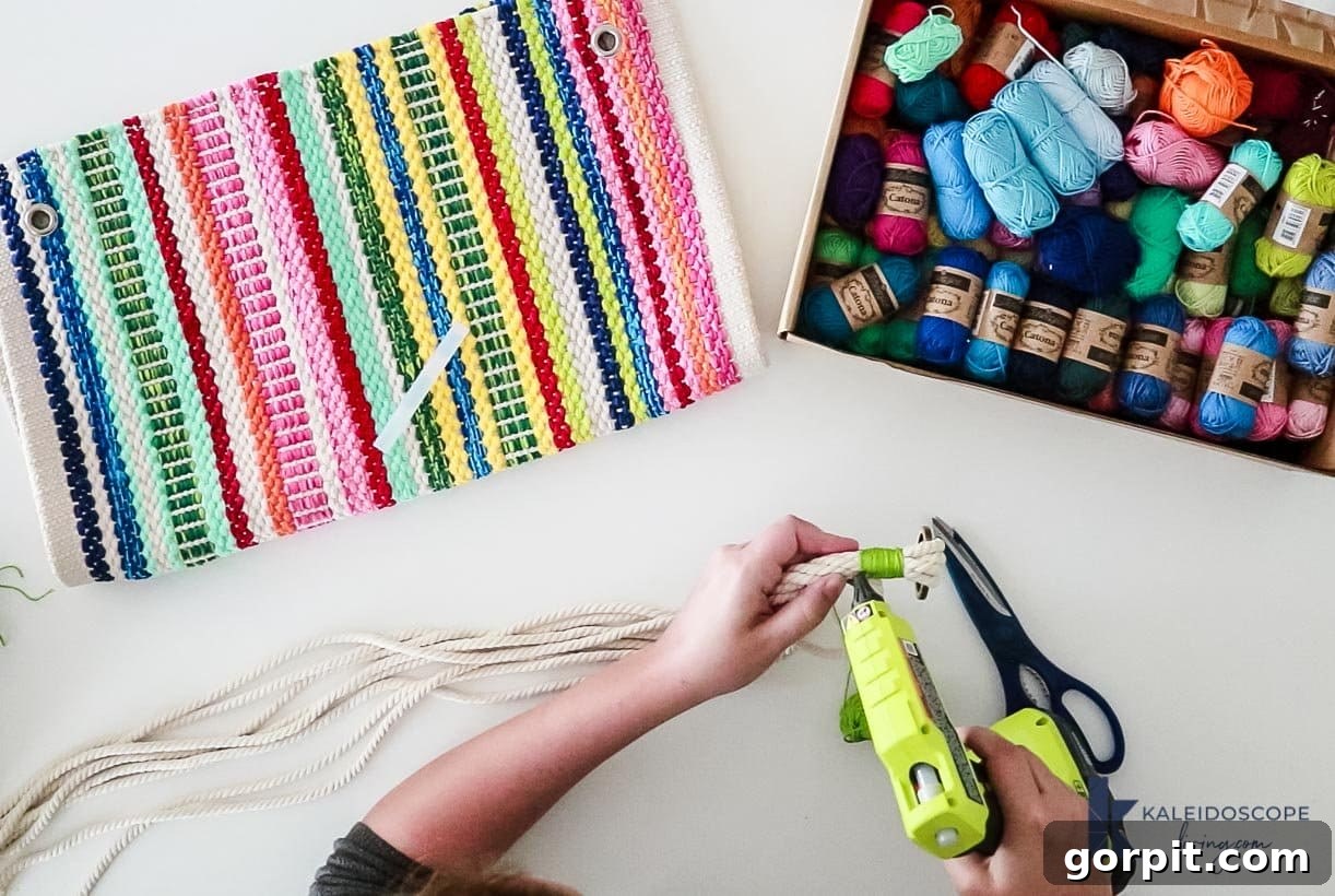 hot glue gun on DIY macrame plant hanger