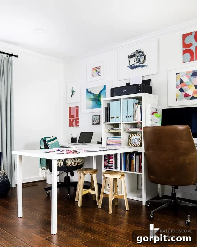 Bright white home office with colorful accents and a large window