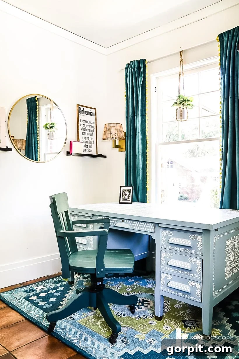 Eclectic home office featuring a stenciled desk, vibrant artwork, and mixed furniture styles