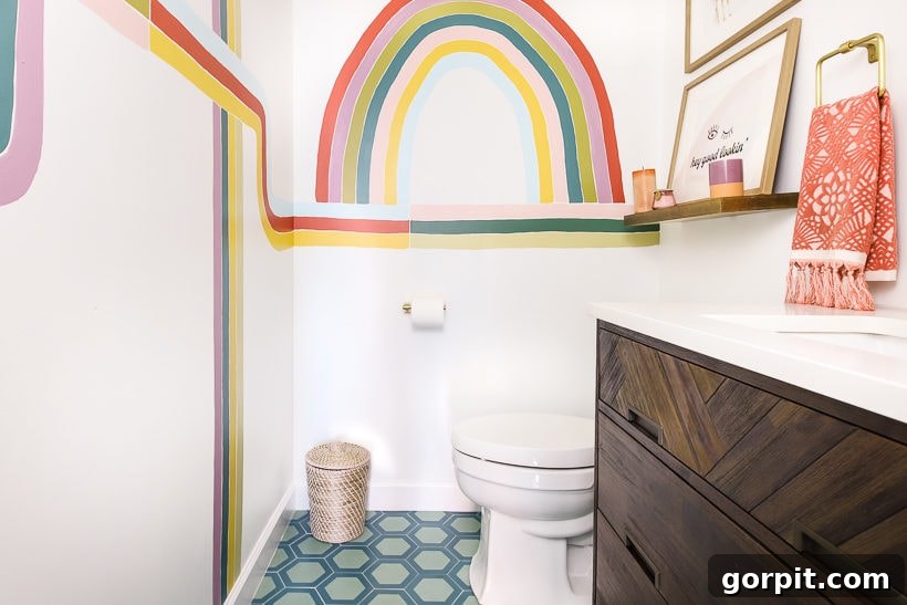 A Burst of Summer: My Colorful Home Unveiled 12 Modern and colorful powder room featuring unique cement tiles, vibrant wallpaper, and stylish fixtures.