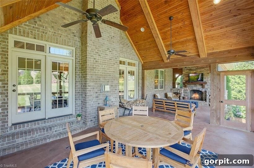 outdoor space with eating area and vaulted ceiling
