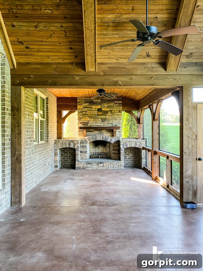 Our New House: The Starting Point Tour Part 1 18 Expansive screened-in porch featuring a large outdoor fireplace and comfortable seating potential.