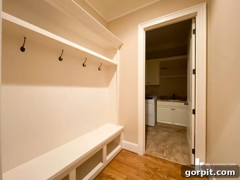 Our New House: The Starting Point Tour Part 1 24 Mudroom entrance with hooks and storage potential, ready for organization.