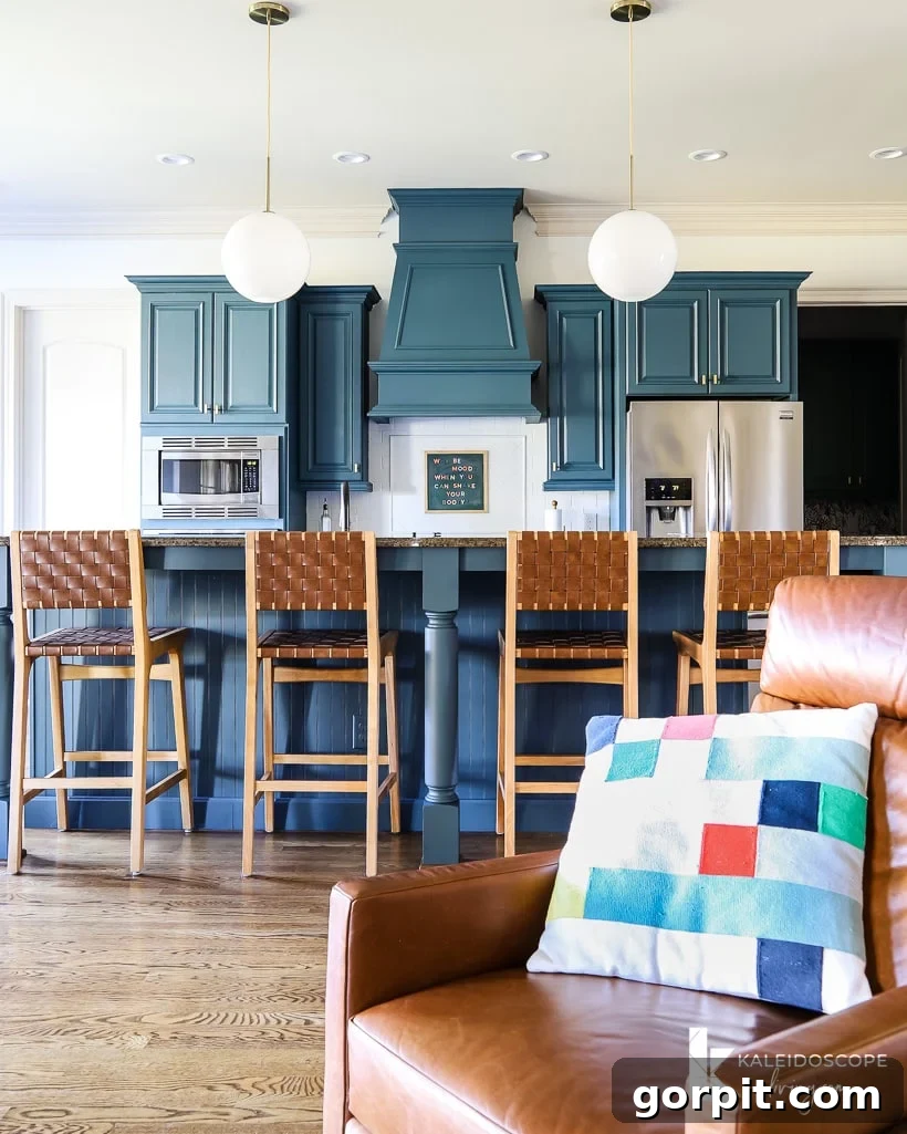 budget-friendly kitchen makeover with painted cabinets and painted tile backsplash
