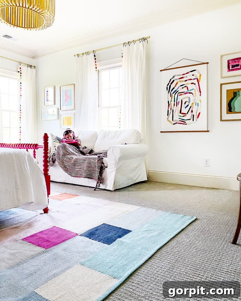 The Art of Grand Scale Elevate Your Home with Oversized Decor and Sourcing Secrets 12 A vibrant child's bedroom featuring a whimsical animal portrait art piece hanging above a bed with colorful bedding.