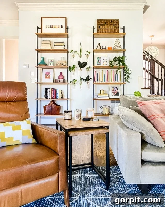 The Art of Grand Scale Elevate Your Home with Oversized Decor and Sourcing Secrets 6 A brightly styled living room with colorful bookshelves adorned with various small art pieces, books, and decorative objects.
