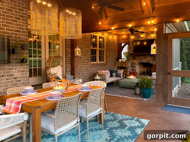 A beautifully decorated screened-in porch illuminated by warm string lights in the evening, creating a magical atmosphere.