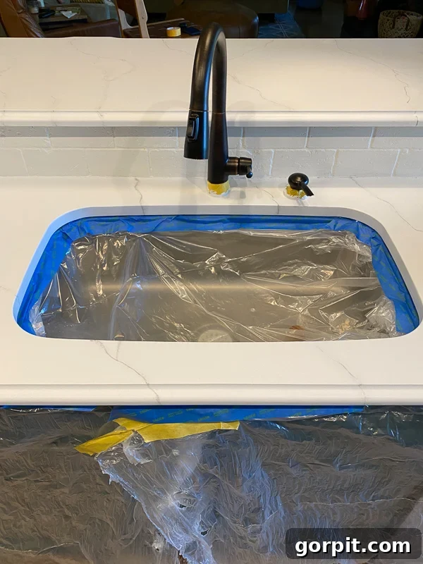 protect sink while painting kitchen countertops with plastic