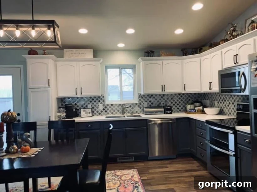 After: Revitalized kitchen with painted cabinets, new lighting, and updated decor, achieving a fresh and modern look without a full remodel.