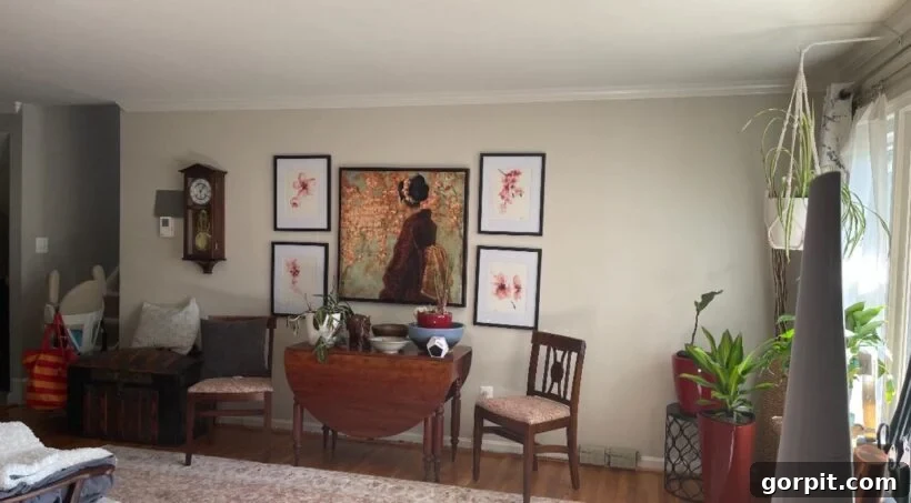 Before: Undefined home nook with simple furniture and plain walls, lacking character and visual boundaries.