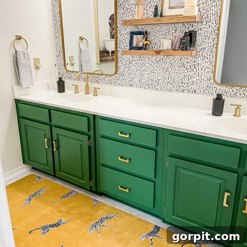 After: Bathroom makeover featuring painted cabinets, updated countertops, and colorful decor, creating a vibrant and personalized space.