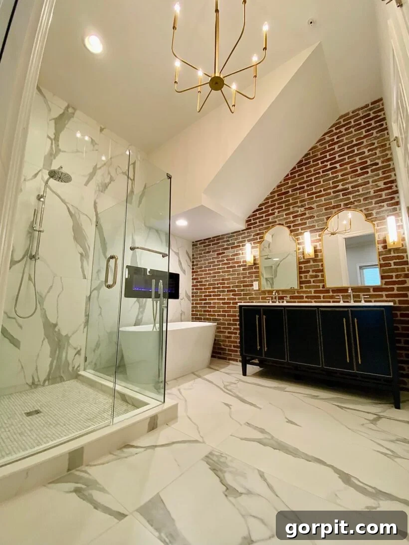 After: Stunning bathroom featuring exposed brick walls, elegant marble vanity, and modern fixtures, creating a sophisticated and unique space.