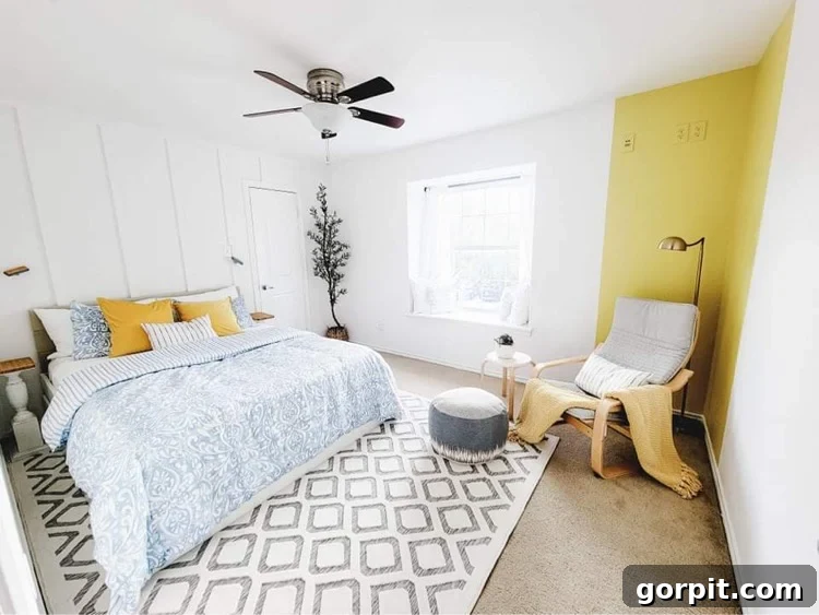 After: Stylish bedroom featuring a dimensional wall treatment, a clever color-block paint accent, and patterned textiles, creating a sophisticated and vibrant space.
