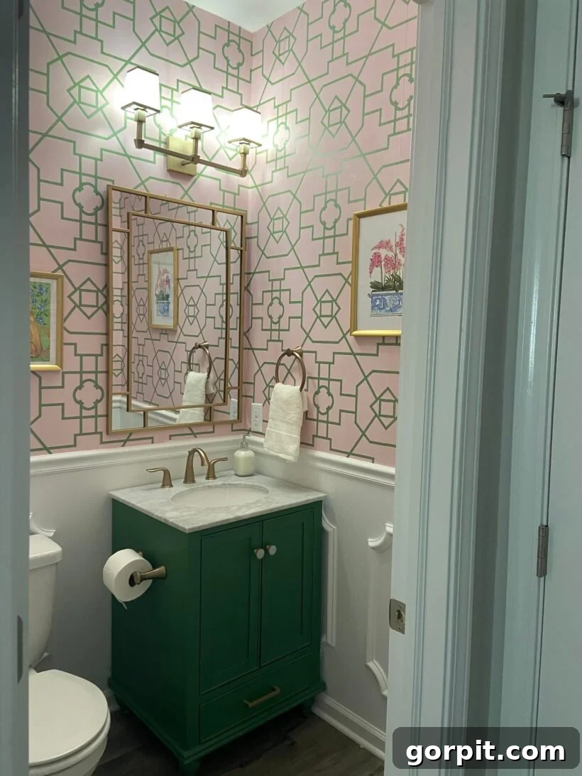 After: Bold and colorful half-bathroom featuring striking patterned wallpaper, vibrant paint, and unique fixtures, creating a dramatic and personalized space.