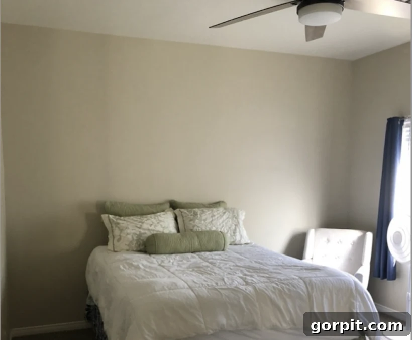 Before: Simple bedroom with plain walls, lacking distinctive style or pattern.