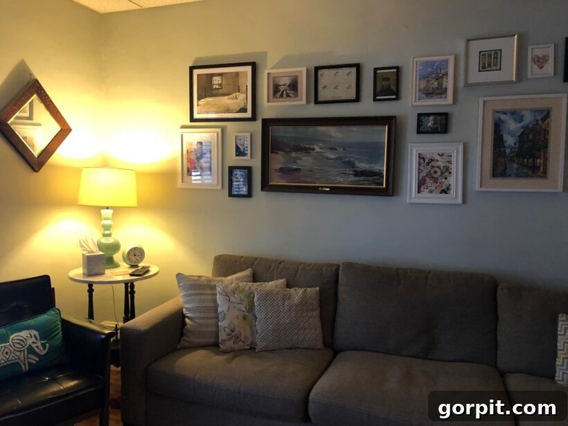 Before: Neutral family room with traditional furniture, lacking vibrant color and distinct personality.