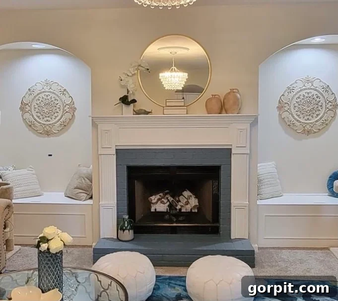 After: Designer in a Binder customer transformation showing a vibrant living room with blue and green accents, including a painted fireplace, creating a refreshing and personalized space.