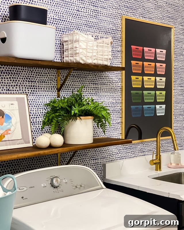 rainbow laundry basket art above sink in colorful laundry room