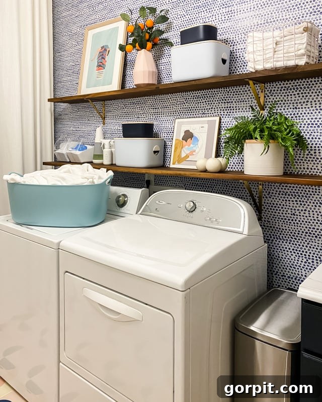 colorful laundry room with open walnut shelves and modern decor