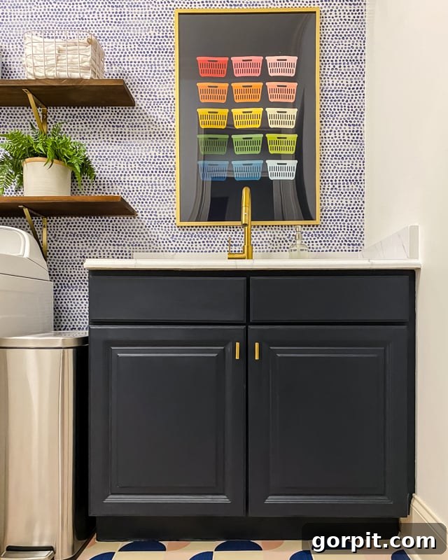 colorful modern laundry room sink area after makeover