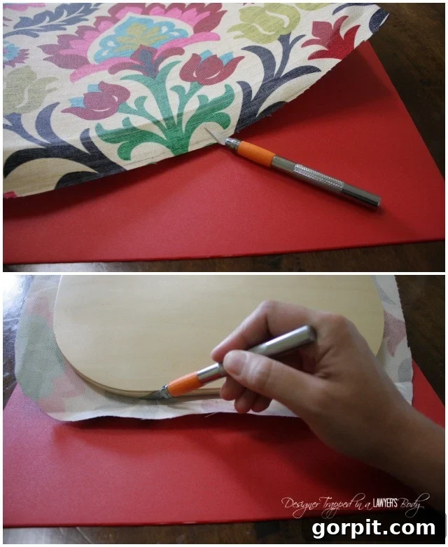 Trimming excess fabric from a decoupaged chair seat with a craft knife