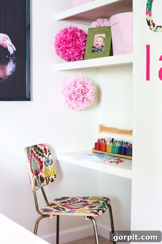 Colorful big girl room featuring a decoupaged wood chair with matching wall decor.