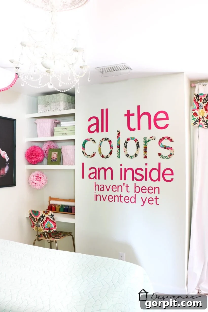 Decoupaged wood chair in a child's room, coordinating with vinyl and a decoupaged wall quote.