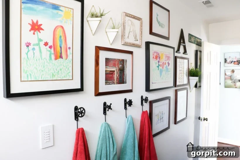 Curated Art for Modern Bathrooms 3 WOW, WOW, WOW! This DIY bathroom remodel is by far one of the best I have seen, and they REALLY did all the work themselves! I love the floor to ceiling subway tile, the black slate tile floor and the penny tile accents. And that floating vanity is amazing.