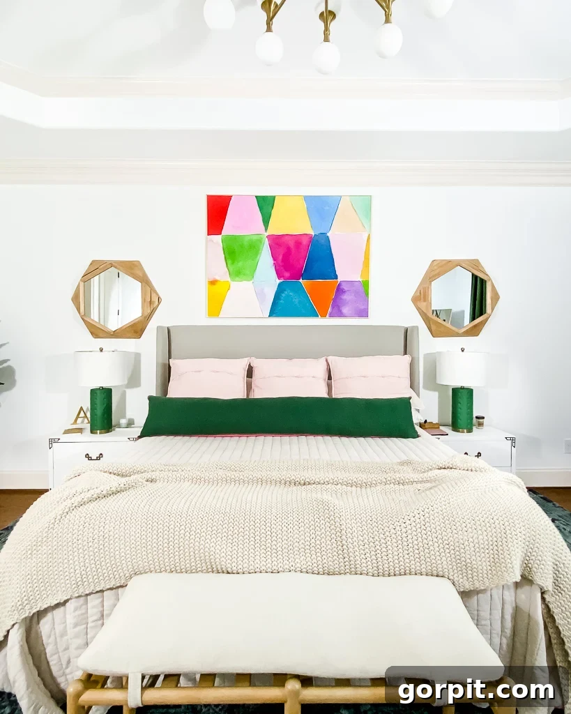 Designer-Approved Bedroom Wall Art Ideas 4 Close-up view of a chic bedroom setting, highlighting a piece of minimalist art above a nightstand with decorative elements.