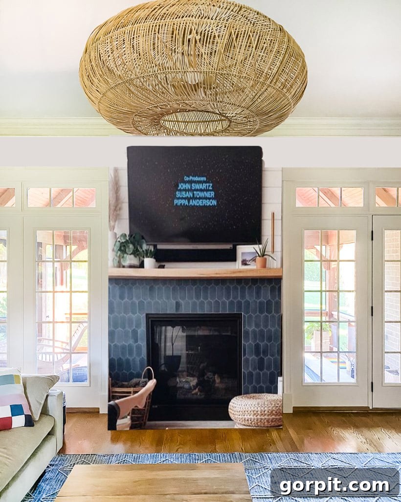 Digital mockup of a renovated family room showing simplified trim and a new fireplace design