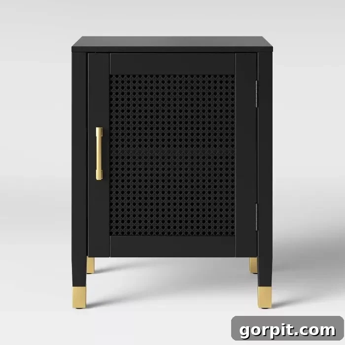 black caned nightstand with gold accents