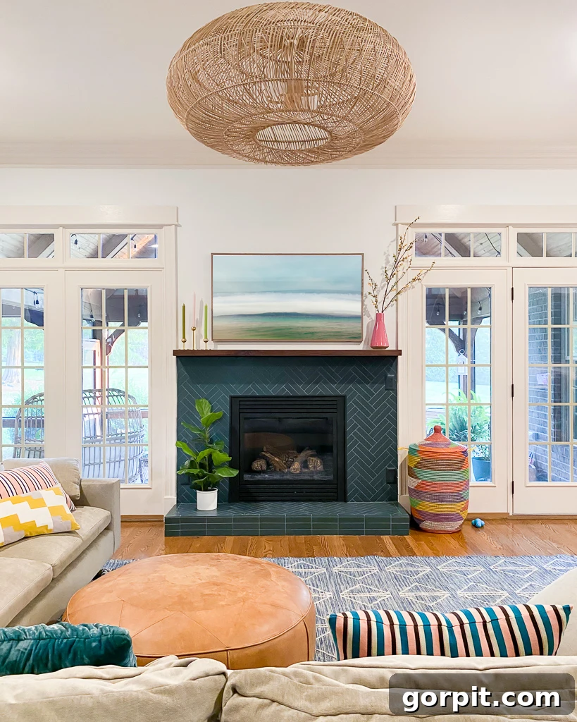 Detailed review of Samsung Frame TV, showing its Art Mode functionality and how it blends into the living room decor above a fireplace.
