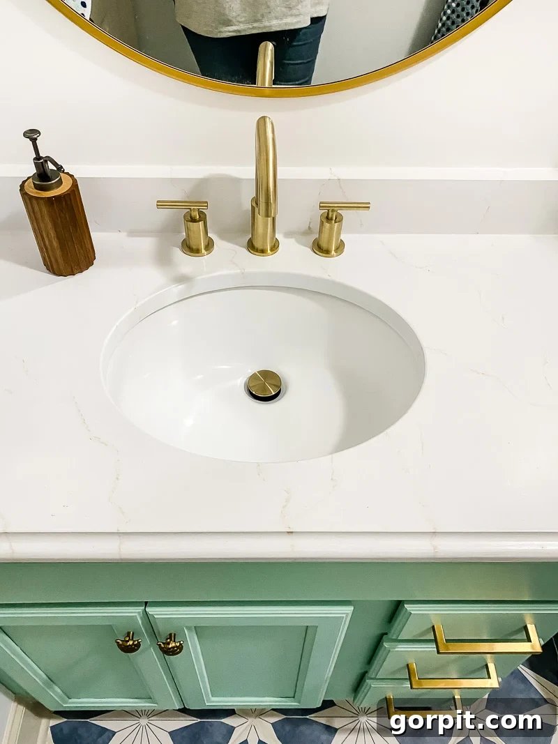 Avery Transforms A Bathroom For Less 11 DIY painted countertop in a budget bathroom makeover
