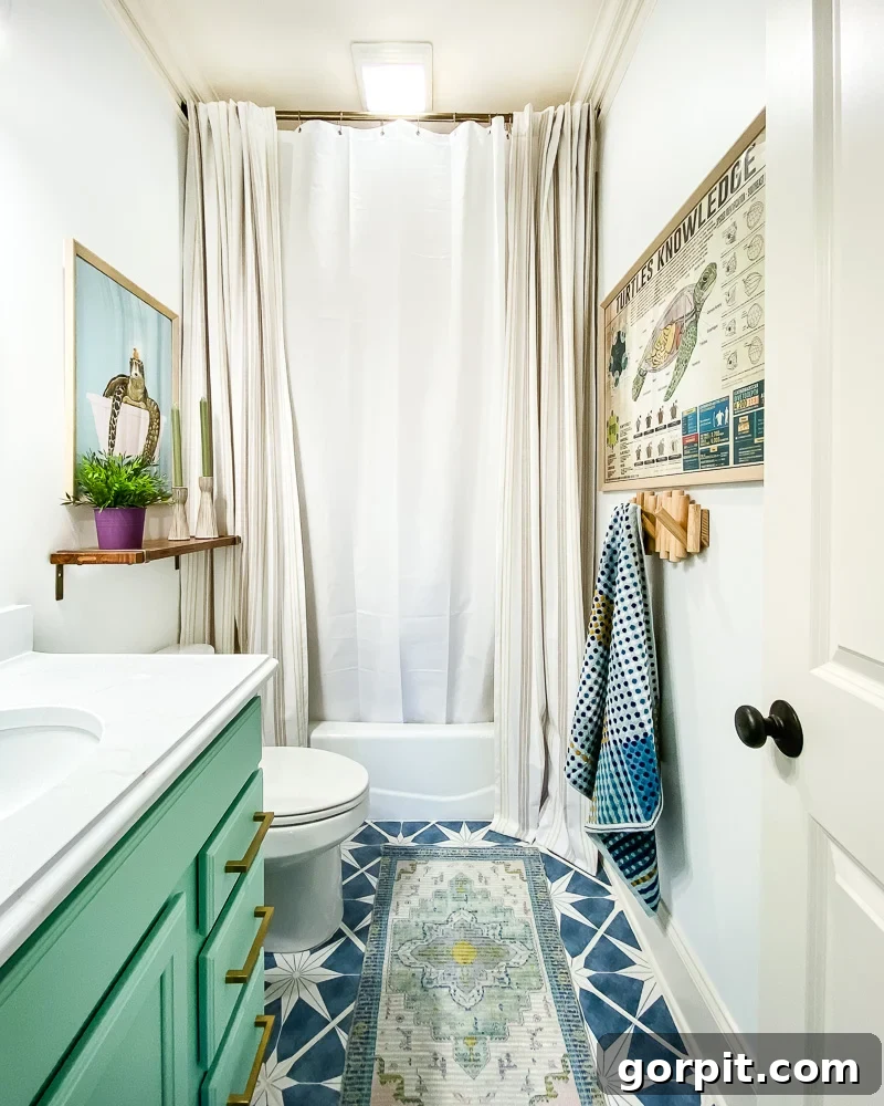 Avery Transforms A Bathroom For Less 16 After image of renovated bathroom with stylish tile stickers and fresh paint