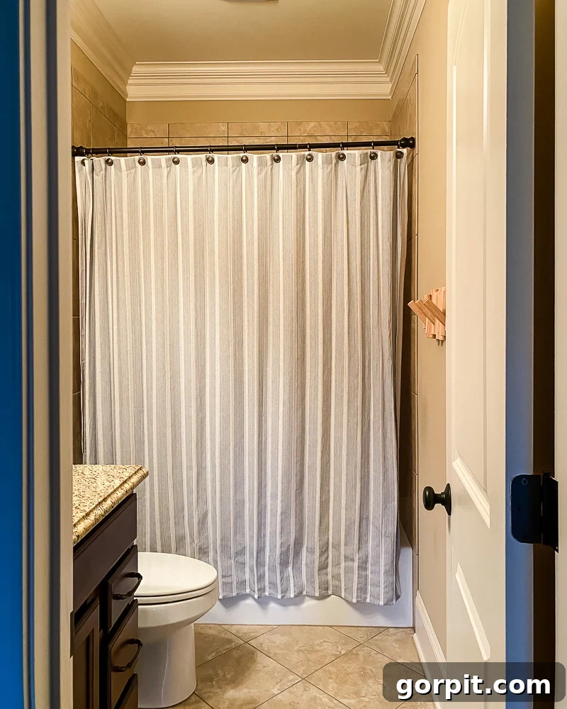 Avery Transforms A Bathroom For Less 3 Outdated brown bathroom before makeover
