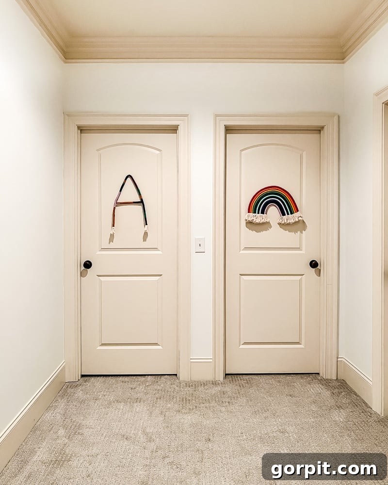 Plain bedroom doors side-by-side in a hallway, awaiting a creative transformation