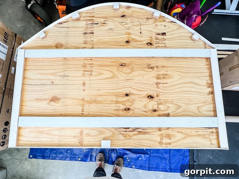 Personalized Message Headboard: Build Your Own 12 Back of DIY headboard showing attached trim and cleats for hanging