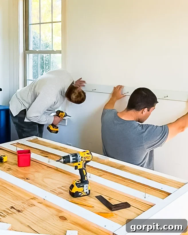 Personalized Message Headboard: Build Your Own 15 Mounting wall cleats for hanging the DIY headboard securely into wall studs