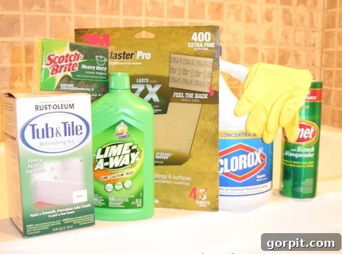 Close-up of the supplies needed to paint shower tiles white are Tub and Tile, Lime-A-Way. Scotch Brite sponge, Plaster Pro, Clorox bleach, Comet and gloves. These are essential for a successful DIY shower tile refinishing project.