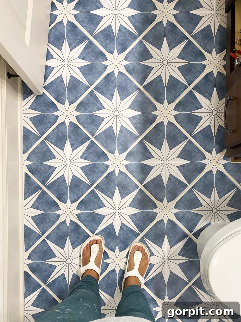 floor tile stickers in bathroom by Tasha Agruso of Kaleidoscope Living
