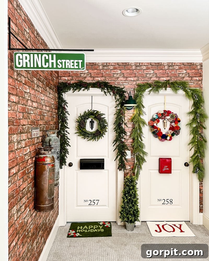 Vibrant Wonderland: Our 2021 Christmas Home Tour Part 2 14 Hallway decorated for Christmas with doors resembling apartment entrances