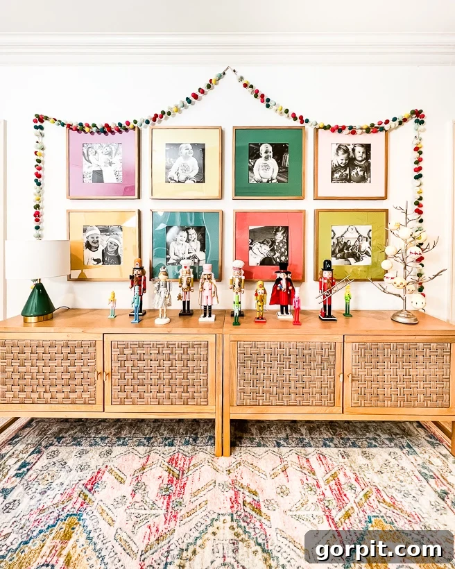 Vibrant Wonderland: Our 2021 Christmas Home Tour Part 2 18 Hallway landing with a gallery wall featuring Christmas photos and a nutcracker collection