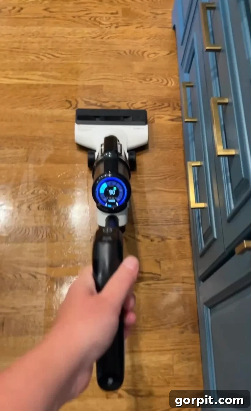 Secrets to a Clean Home with Dogs 7 Tineco hard floor cleaner being used on hardwood floors, illustrating effective pet-friendly cleaning.