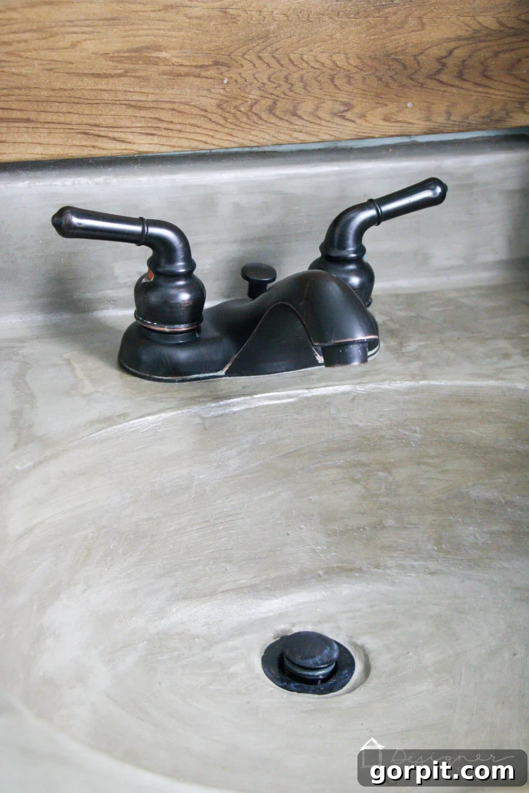 Beautifully finished DIY concrete sink in a stylish bathroom