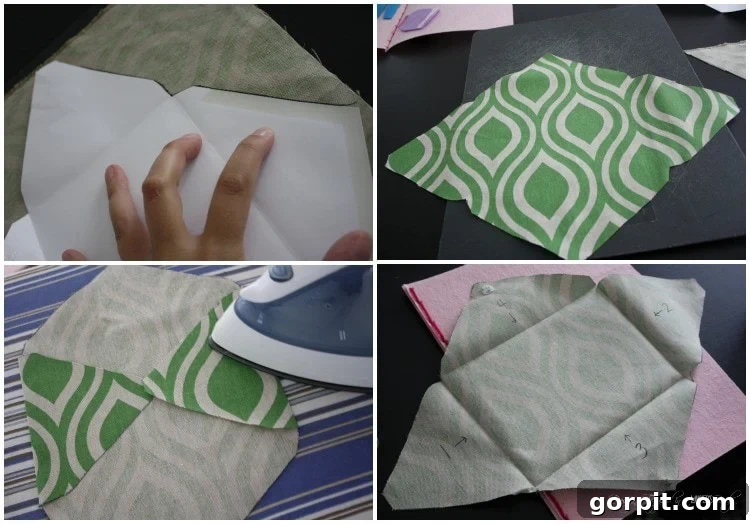 A finished DIY felt dress-up doll book opened to reveal a fabric envelope glued inside, with Velcro closures and numbered flaps for organizing doll clothes.