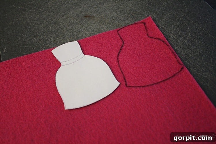 Collection of colorful felt doll clothes and accessories, including dresses, skirts, and hair pieces, spread out on a flat surface, ready for embellishment.